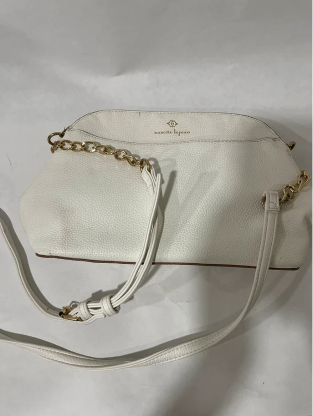 Woman’s white shoulder bag purse